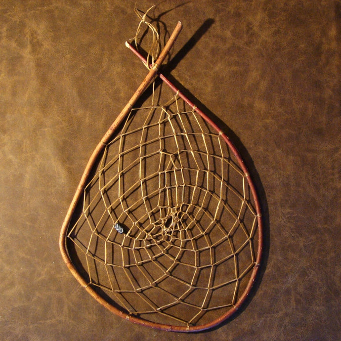 Handwoven Native American Indian (Ojibwe) dreamcatcher. Created in the Ojibwe traditional method from real willow sticks with a handcarved bone pony bead. (Colored by wild berries.)